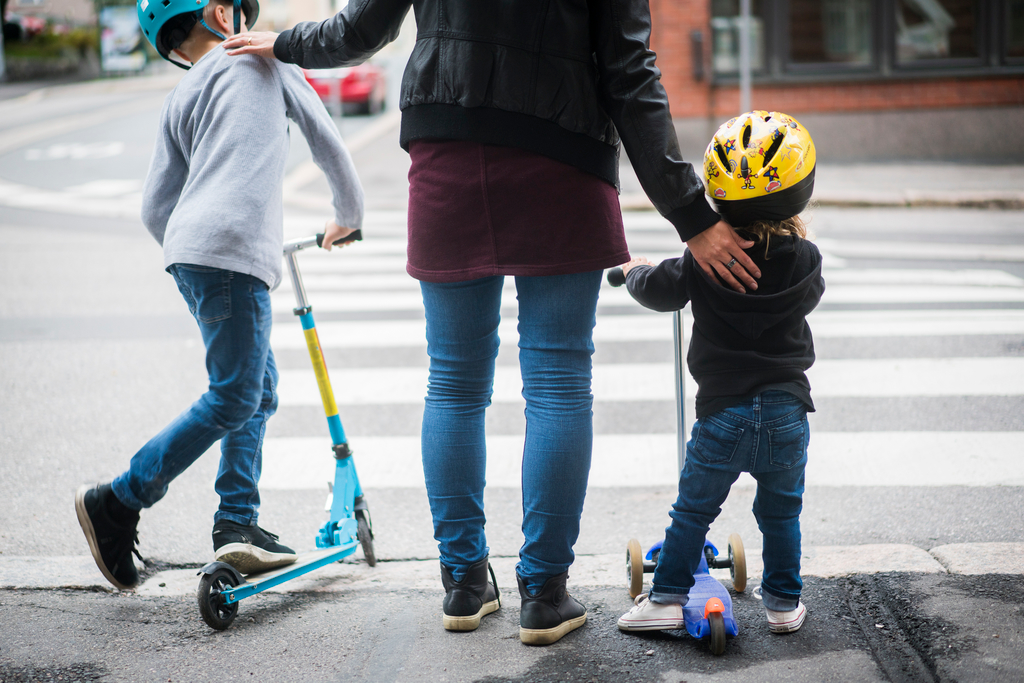 A woman with two children.