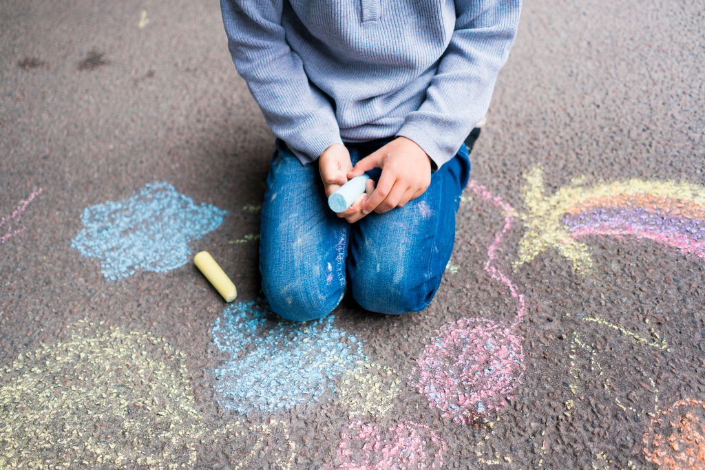Chalk drawings on the street.