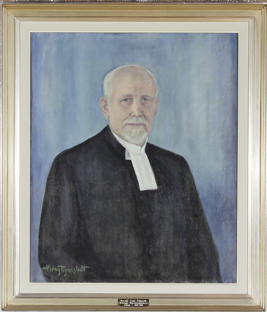 Mies, jolla on papin liperit kaulassa.